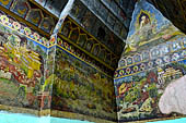 Paintings on the wall of the outer cloister of the Mahamuni Paya, Mandalay, Myanmar 